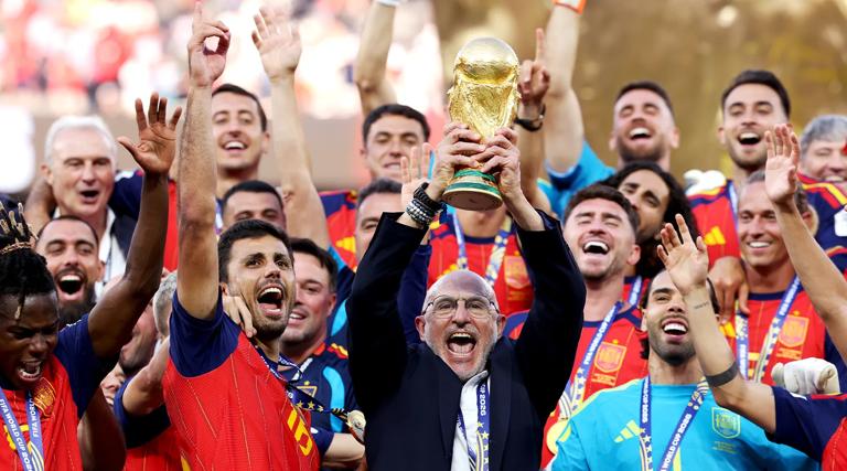 EAST RUTHERFORD, NEW JERSEY - JULY 19: Luis de la Fuente, Head Coach of Spain, lifts the FIFA World Cup Winner’s Trophy after the team’s victory following the FIFA World Cup 2026 Final match between Spain and Argentina at New York New Jersey Stadium on July 19, 2026 in East Rutherford, New Jersey. (Photo by Alex Pantling - FIFA/FIFA via Getty Images)